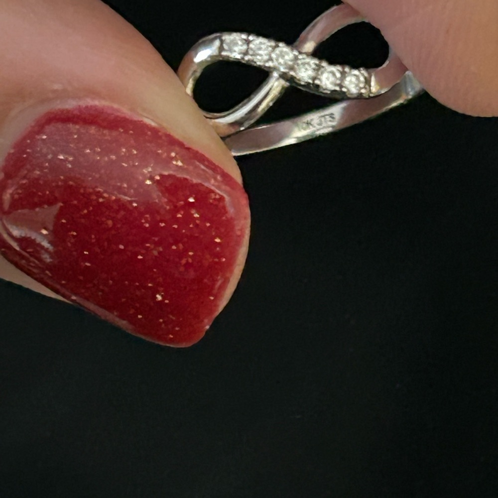 White gold infinity ring .
